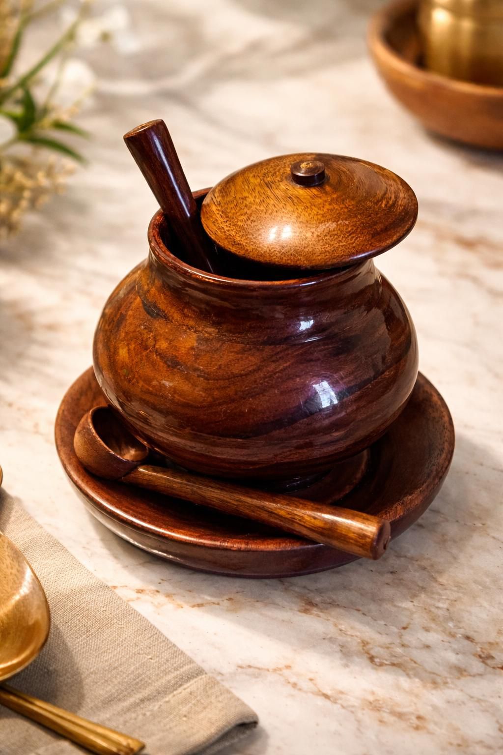 Handmade wooden sugar pot with a lid and spoon